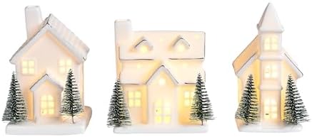 ceramic white christmas village houses, light up porcelain on a desk or shelf