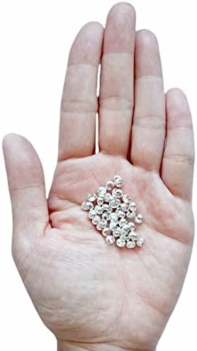 925 sterling silver open crimp bead covers, 4mm on a desk or shelf