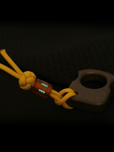 viperade vab5 pei paracord beads, knife lanyard beads on a desk or shelf