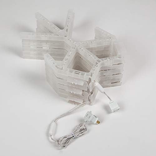 kringle traditions 36" folding cool white snowflake decoration on a desk or shelf