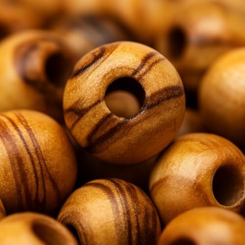 jerusalem olive wood making a rosary beads supplies on a desk or shelf