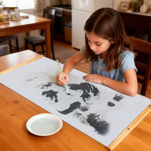 magic canvas paint with water,includes 2 interchangeable canvas shown in use
