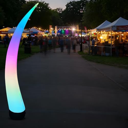 inflatable color changing tusk 10’, sand bag base shown in use