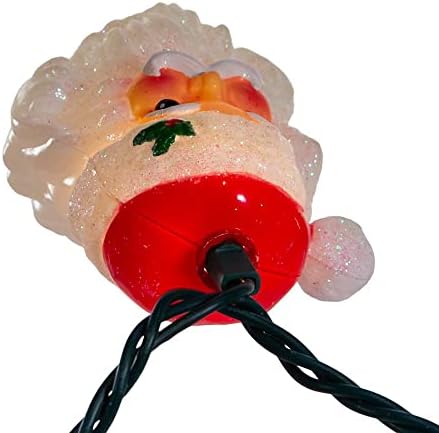 kurt s. adler ul 10-light santa head light on a desk or shelf