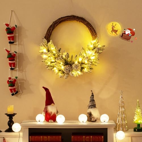 goflame 24” pre-lit artificial christmas wreath, snow flocked shown in use