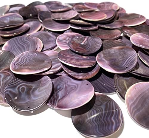 abcgems darkest wampum shell pendant beads usa coin on a desk or shelf