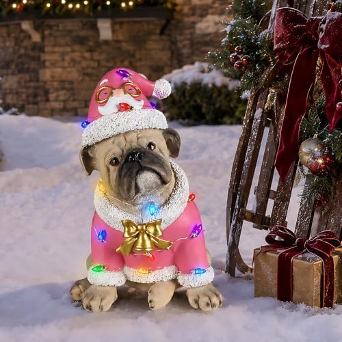 lighted christmas bulldog statue, pink outfit on a desk or shelf