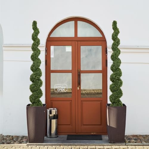 the bloom times 7ft large spiral topiary trees on a desk or shelf