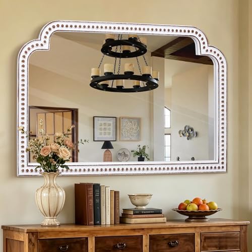 24x36 inch ornate scalloped arch mirror, wooden antique, side view
