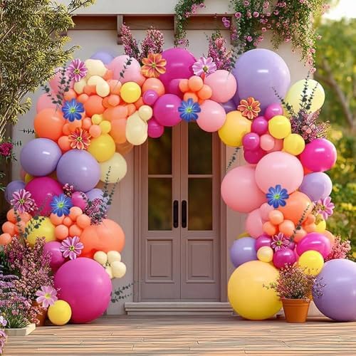 hot pink purple balloon arch double stuffed balloons on a desk or shelf