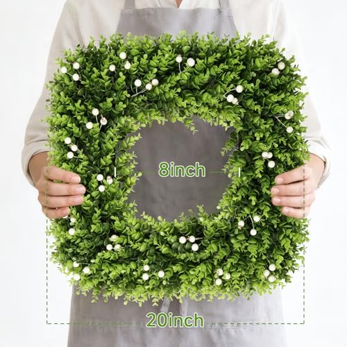20 in boxwood wreath with white berries, all shown in use