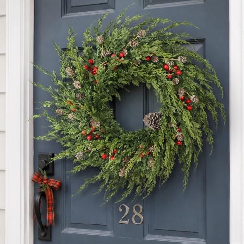 24" artificial christmas cedar wreath with berry for shown in use