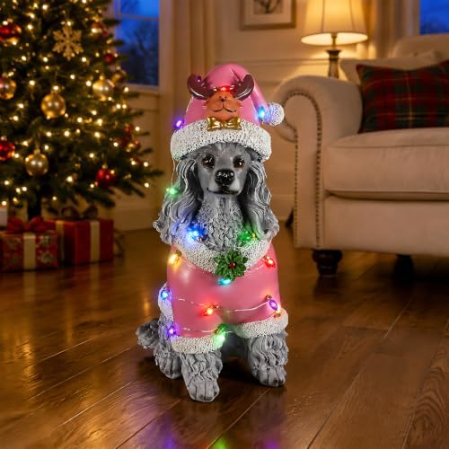 lighted christmas poodle statue, pink outfit, front angle view