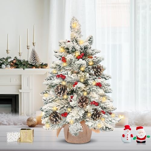24"/2ft thick snow flocked tabletop christmas tree battery on a desk or shelf