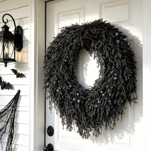 dn deconation halloween wreath for front door, decorations shown in use