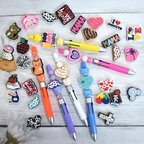 silicone focal beads bulk, different random mix collections on a desk or shelf