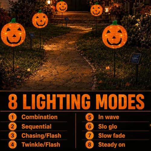 solar halloween pumpkin stake light with 8 lighting on a desk or shelf