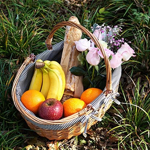 good gain picnic basket with folded handles,wicker empty on a desk or shelf