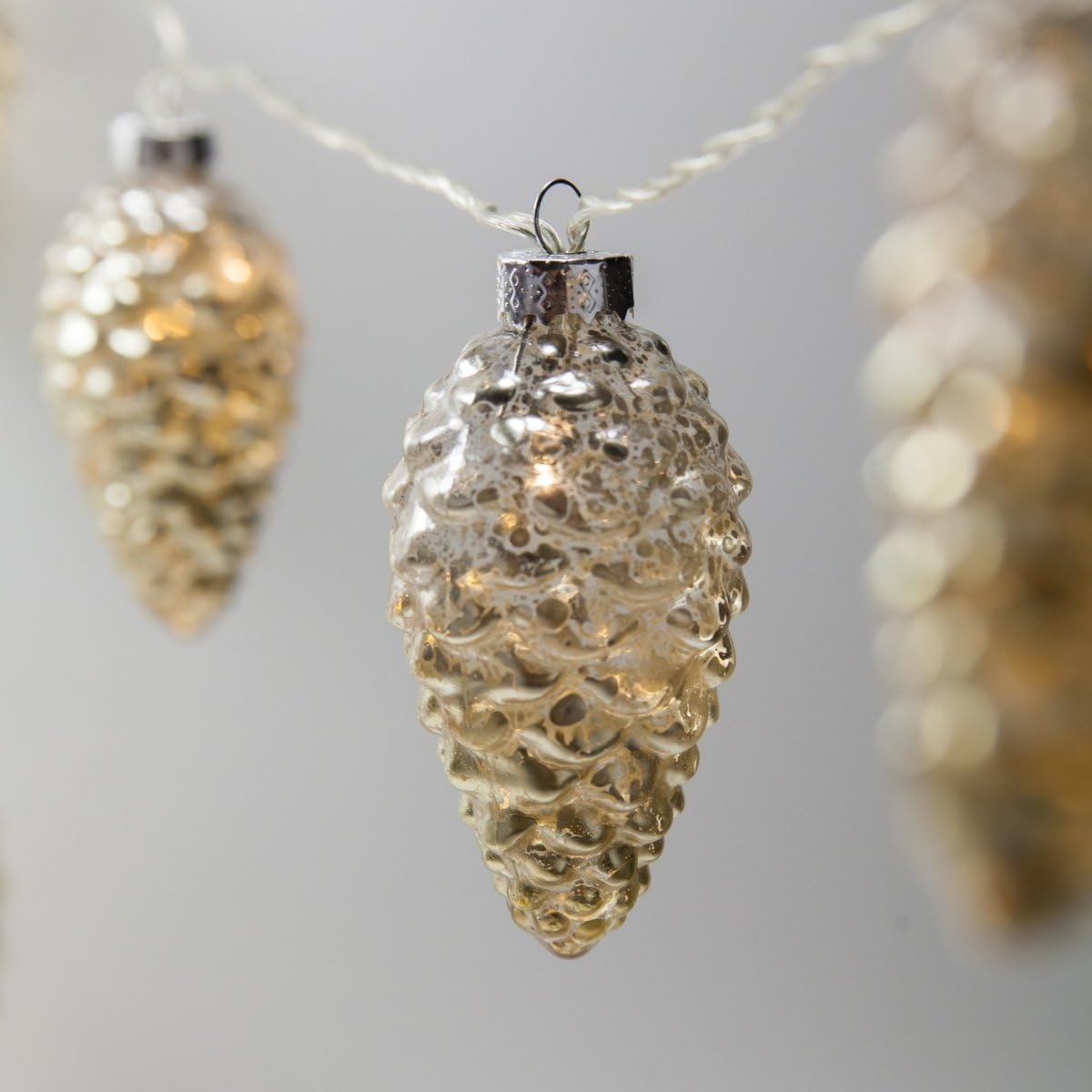 wintergreen lighting 6’ mercury glass gold star lights/gold shown in use