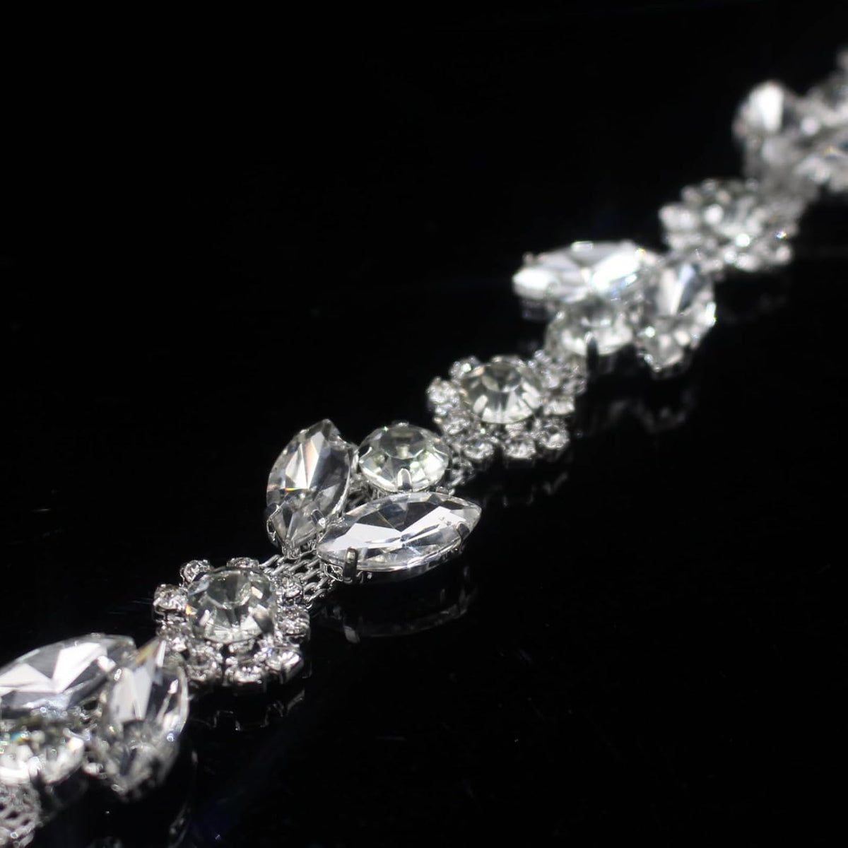 3 yard rhinestone trim chain silver string crystal on a desk or shelf