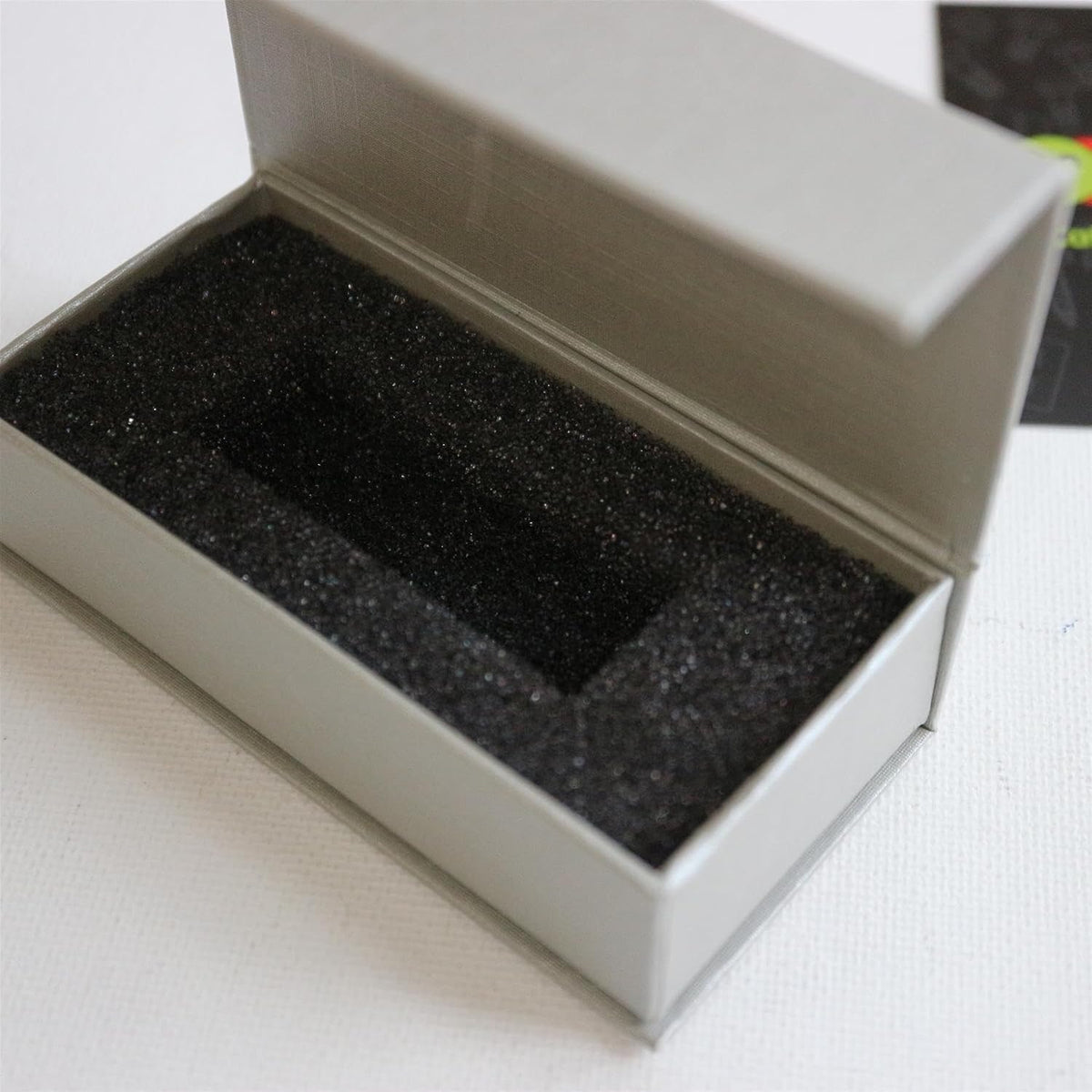 silver grey magnetic usb presentation gift boxes, flash on a desk or shelf