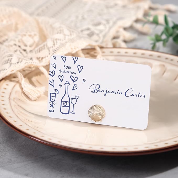 UNIQOOO 12Pcs Decorative Gold Shell Place Card Holders Bulk, Scallop Name Card Stands Set, for Beach Wedding Decor Coastal Favors, Table Setting, Business Card, Name Tag, Party Food Labels