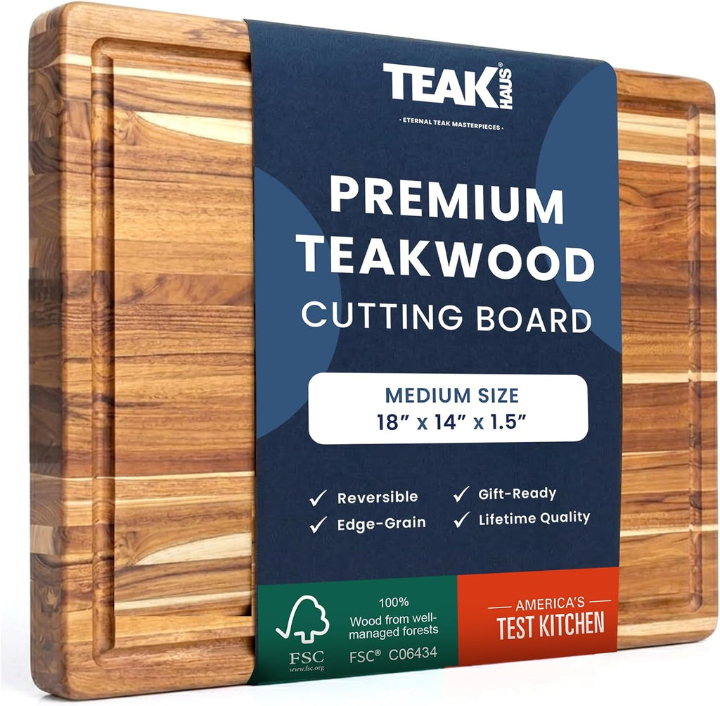 teakhaus edge-grain teak wood cutting board with juice shown in use