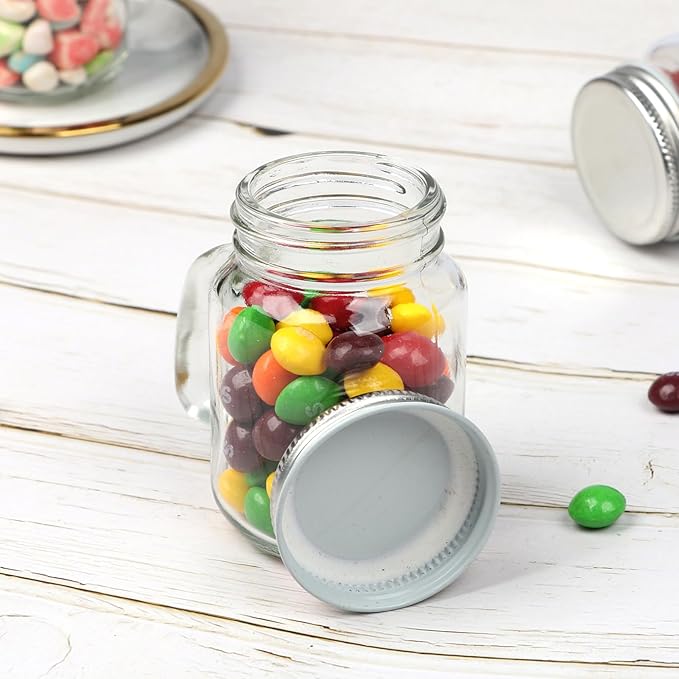 4 oz Small Mason Jar Mugs with Handle, 24 Pack Mini Glass Jars with Airtight Metal Lids, Empty Glass Mugs with Kraft Paper Gift Tag for Party Wedding Favor