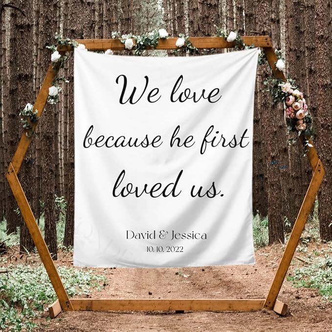 We Love Because He First Loved Us Backdrop,Custom Tapestry with Names and Date,Rustic Wedding Sign,Personalized Calligraphy Wedding Banner for Ceremony,Reception Backdrop,One Size