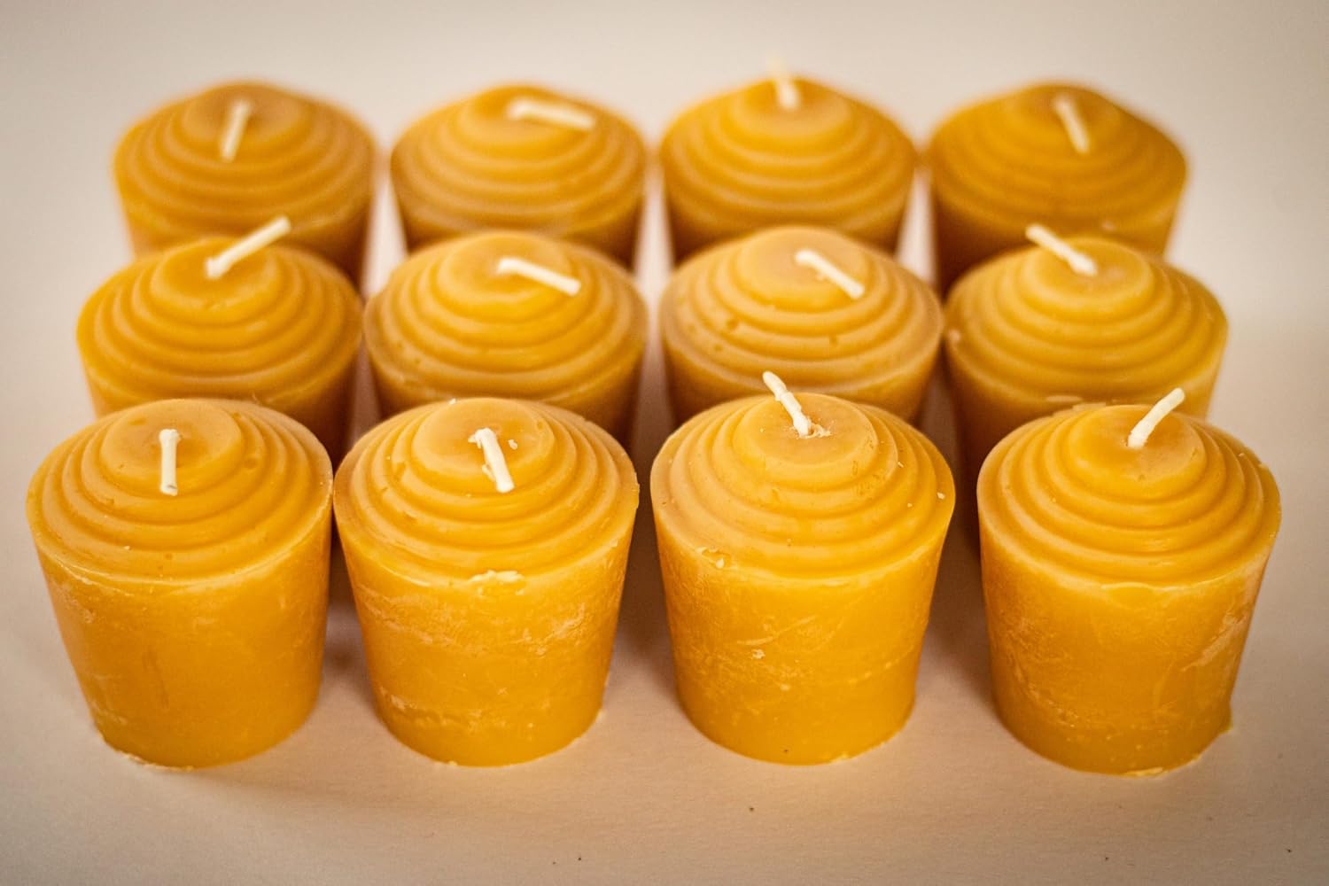 100% Pure Beeswax Votive Candles - USA-Sourced Handmade Votives for Home, Christmas, and Advent, Smokeless Unscented 12 Candle Set with Natural Honey Aroma, 1.96 x 1.77 Inches, by BeeTheLight