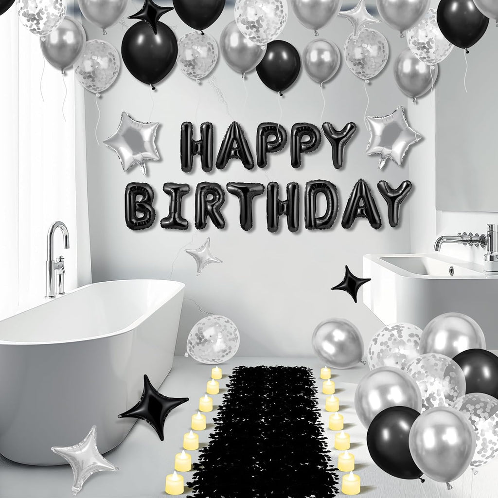 black happy birthday balloons decorations silver and black on a desk or shelf