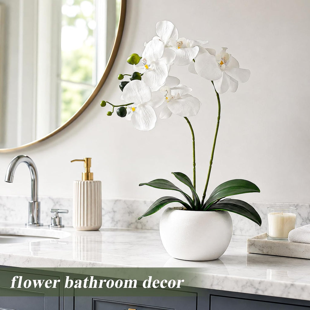 artificial flowers indoor, white fake orchid in pot on a desk or shelf