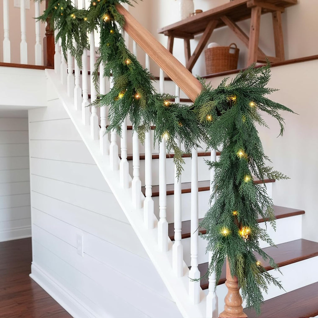 christmas cedar garland realistic with lights - cypress, close-up detail