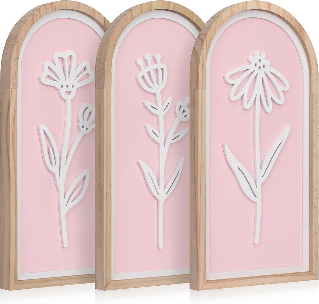 Pink 3D Wooden Floral Wall Art Set of 3, Arched Boho Girls Room Wall Decor | Pink arched panels with raised white floral cutouts in wood frames; ready to hang in bedrooms, teen rooms, dorms or hallways