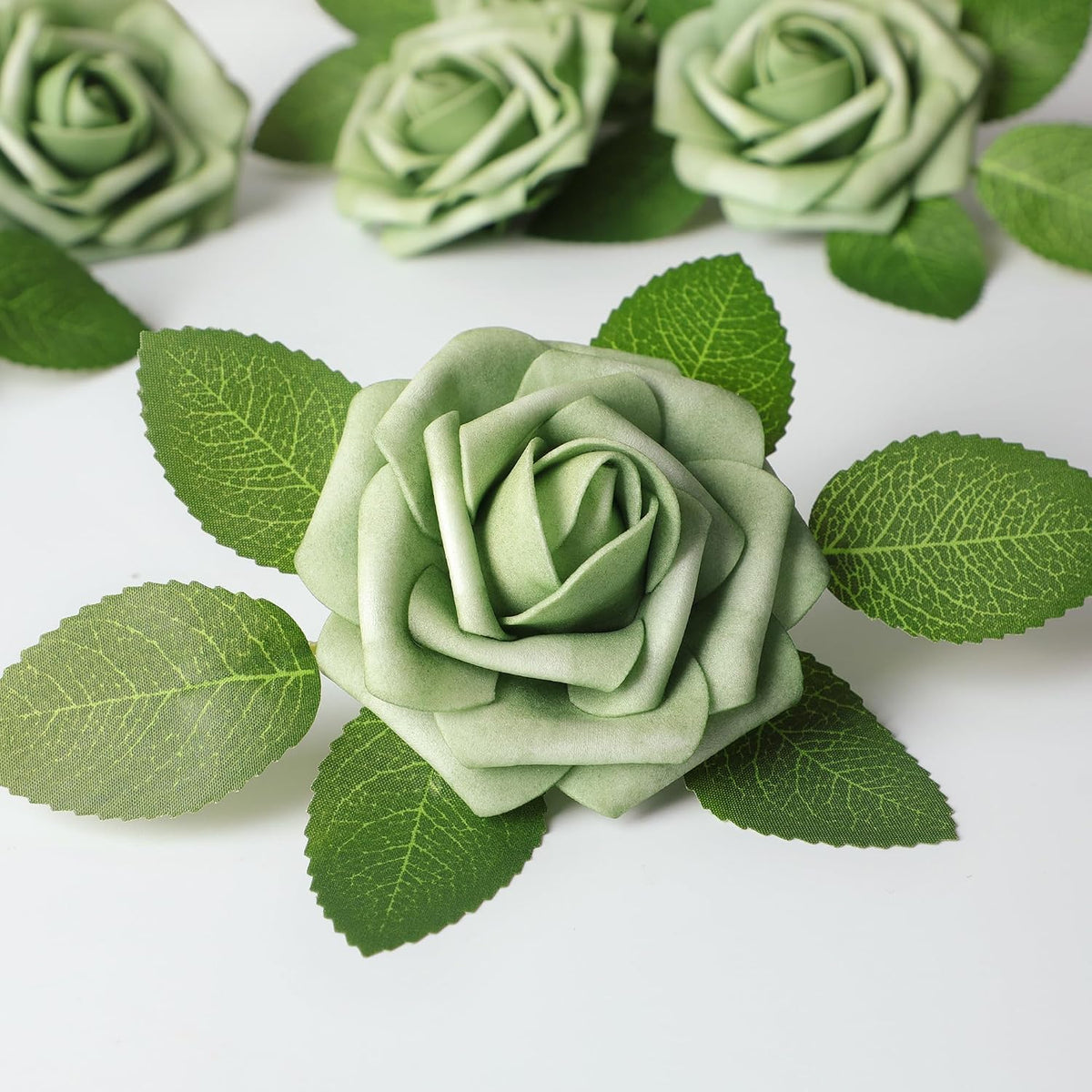 mocoosy 50pcs rose artificial flowers, sage green fake shown in use