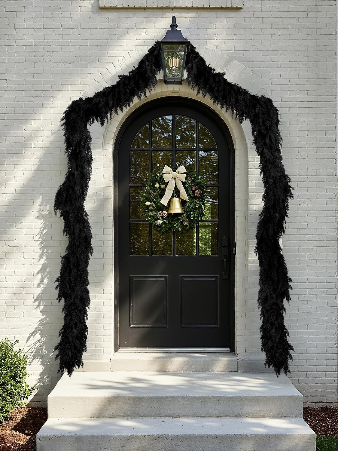 9 ft halloween cedar garland, black real touch shown in use