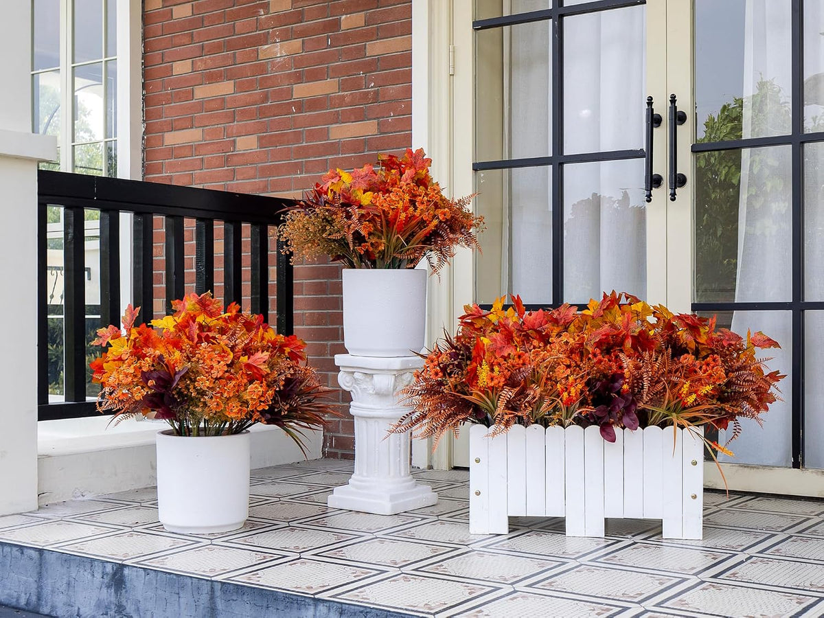 artificial fall flowers outdoors, faux maples & mums, close-up detail