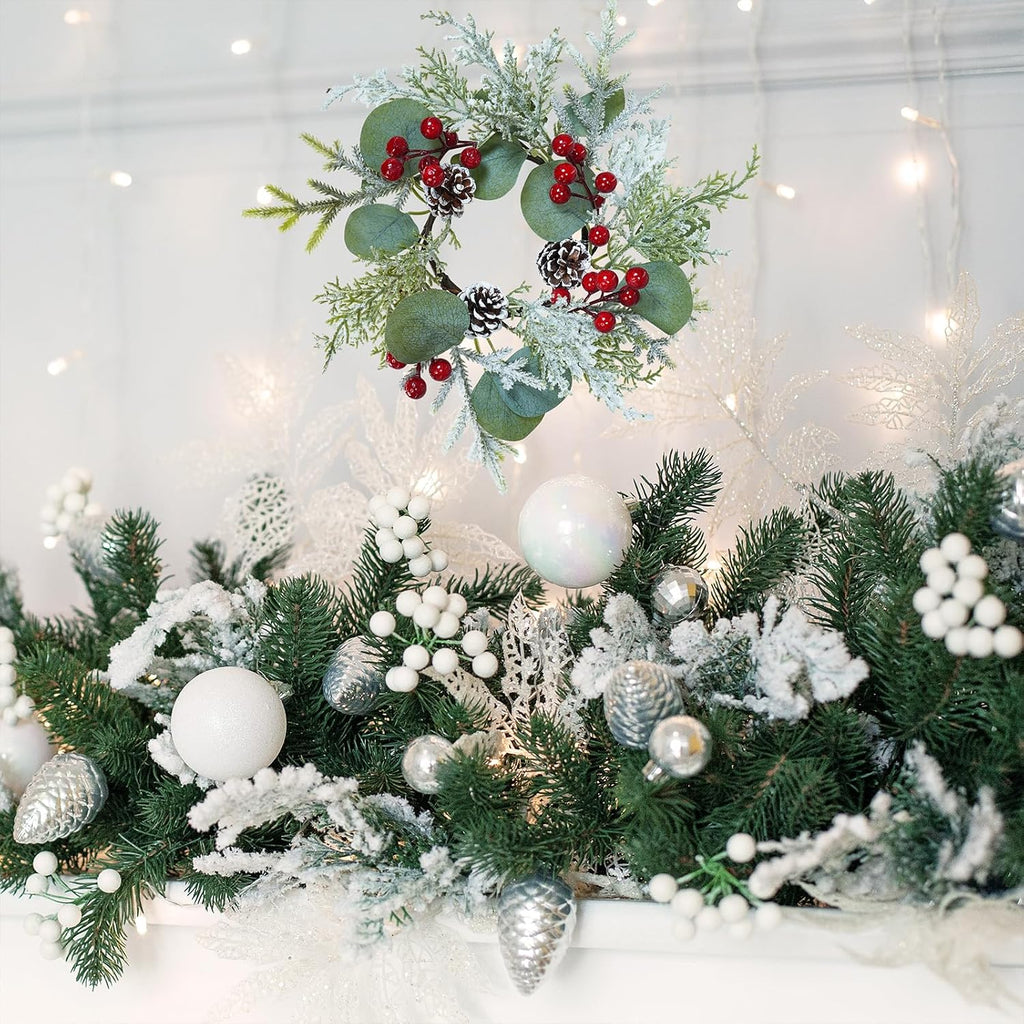 Winlyn 4 Pcs Artificial Eucalyptus and Snowy Cedar Candle Rings Christmas Candle Holder Rings Mini Window Wreaths 12.2" Wide with Red Berries Pine Cones for Holiday Winter Wedding Seasonal Decoration