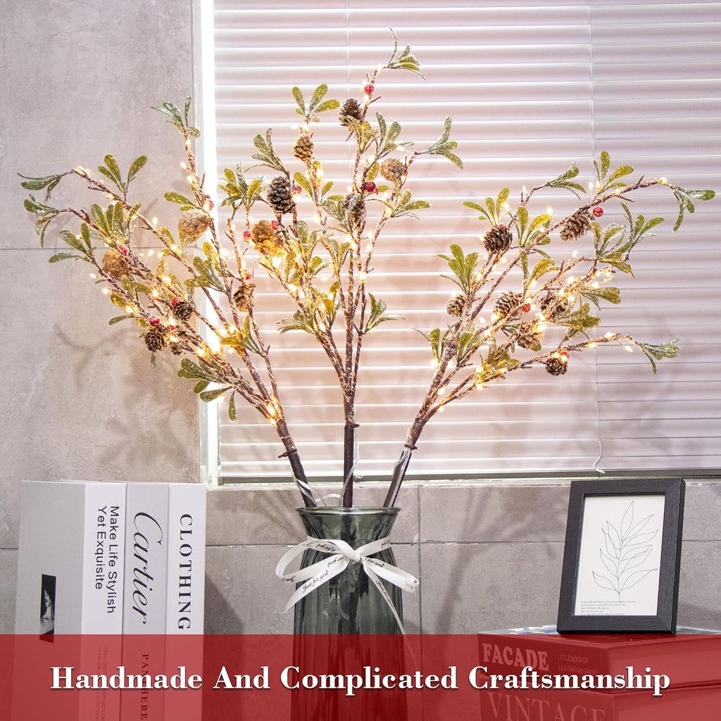 lighted christmas evergreen sprig branches tree, handmade leaf, side view