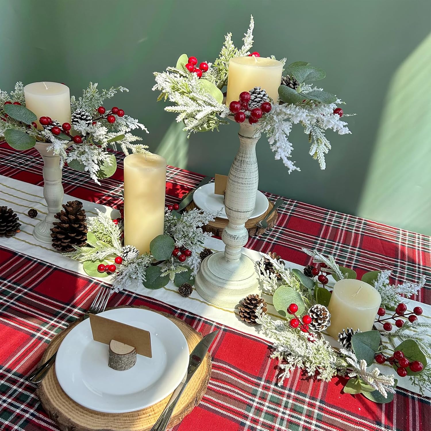 Winlyn 4 Pcs Artificial Eucalyptus and Snowy Cedar Candle Rings Christmas Candle Holder Rings Mini Window Wreaths 12.2" Wide with Red Berries Pine Cones for Holiday Winter Wedding Seasonal Decoration