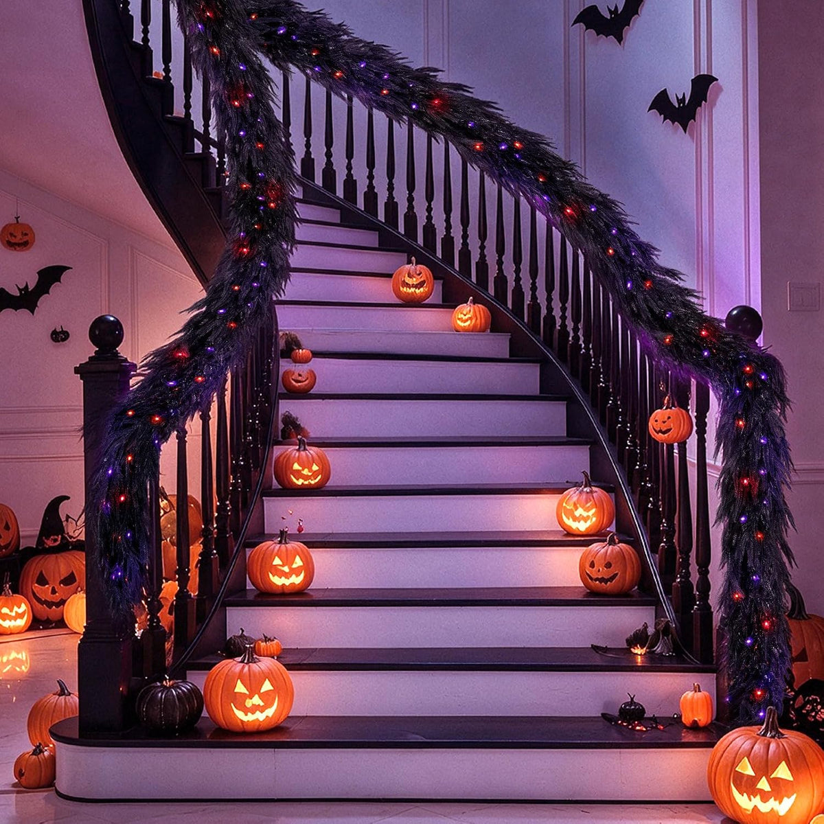 9ft soft touch black norfolk pine halloween garland on a desk or shelf