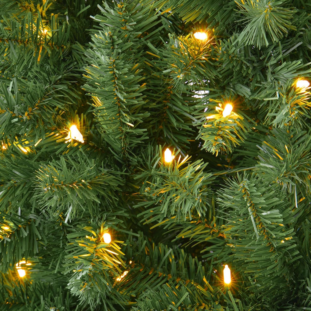 6 ft pre-lit christmas tree spruce with remote shown in use