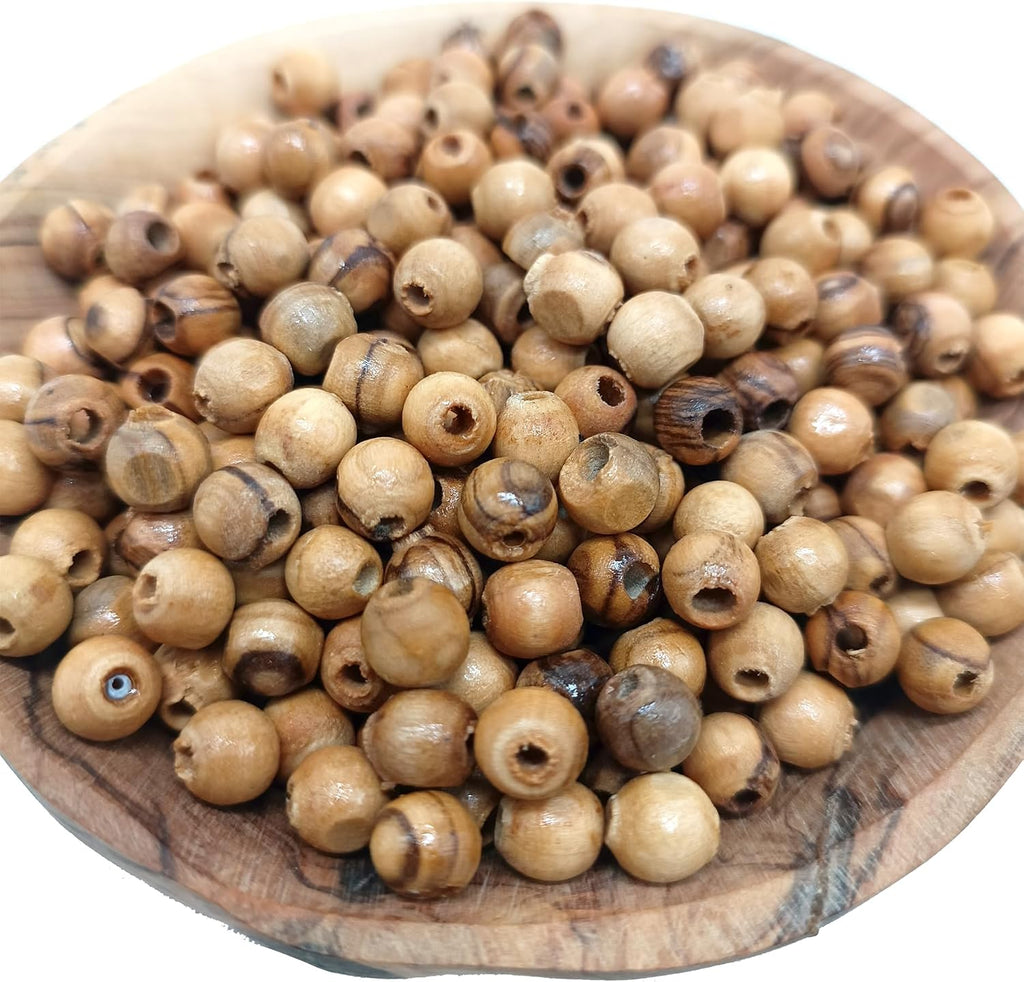 holyland olivewood bead 7mm rosary beads for sale shown in use