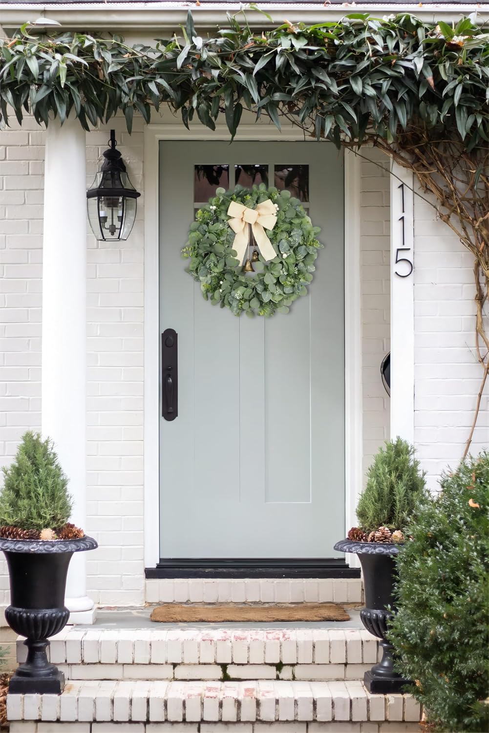 28 inch eucalyptus wreath with bells & bow on a desk or shelf