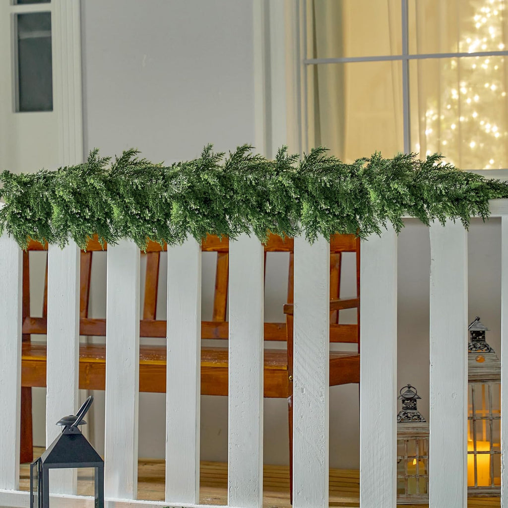 joyin 6 ft cedar christmas garland, realistic pine on a desk or shelf