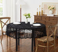 LinenZone Extra Large Black Round Tablecloth for Rustic Vintage Decor. Sheer Lace Table Cloth Works Great As Wedding Tablecloth or Thanksgiving Table Cover. (Mia 132 Round, Black)