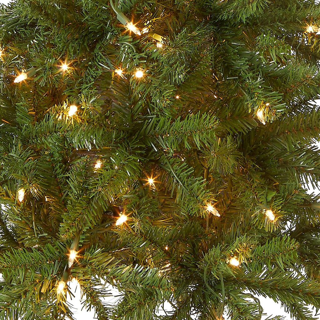 national tree company 4.5ft pre-lit kingswood fir slim shown in use